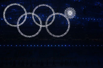 Four of the five Olympic Rings are seen lit up at the start of the opening ceremony of the 2014 Sochi Winter Olympics, February 7, 2014.