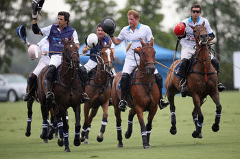 Royal Salute World Polo Ambassador Malcolm Borwick, Prince Harry, and Argentine player Nacho Figueras compete during the Sentebale Royal Salute Polo Cup in Palm Beach at Valiente Polo Farm on May 4, 2016 in Palm Beach, United. The event will raise money for Prince Harrys charity Sentebale, which supports vulnerable children and young people living with HIV in Lesotho in southern Africa.  (Photo by Chris Jackson/Getty Images for Royal Salute)